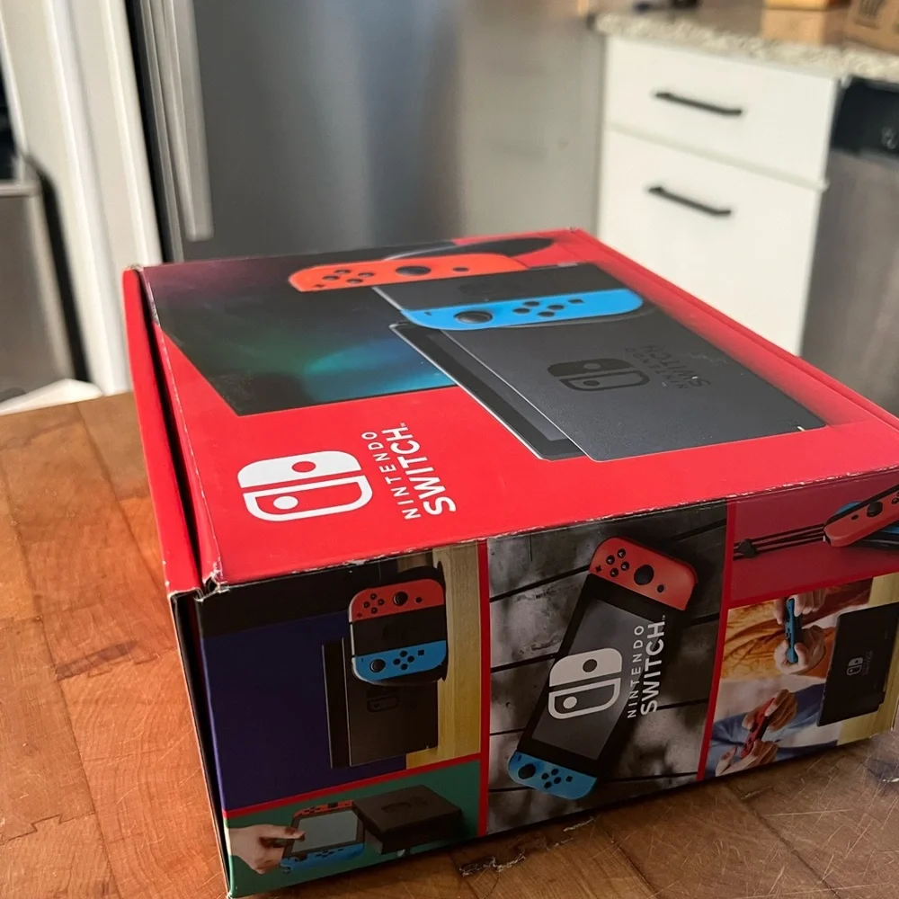 Nintendo Switch Console with Blue and Red Joy-Con